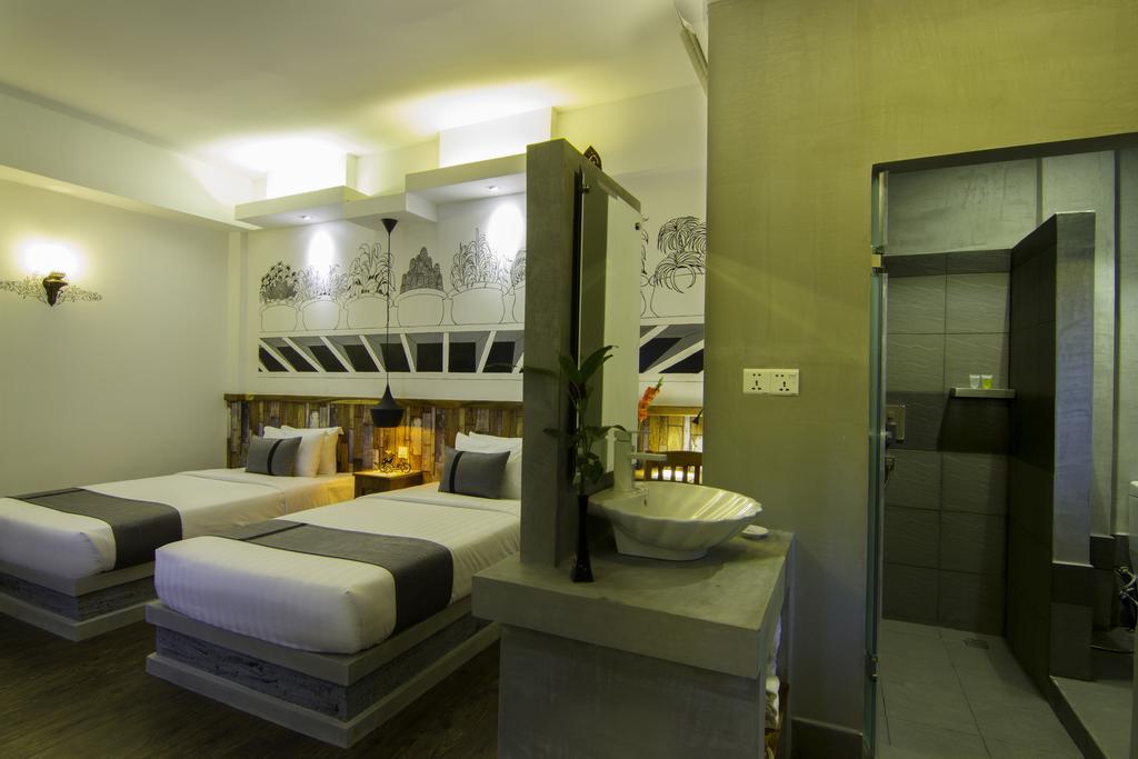 Double Leaf Boutique Hotel Phnom Penh Værelse billede
